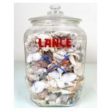 Glass Jar Filled With Assorted Seashells