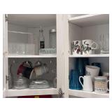 Contents of (2) cabinets- clear glass, pottery mugs, clear acrylic caddy, mugs, blue acrylic cups