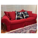 Sleeper sofa……has a red slip cover over a white upholstery…..you’re buying as is…..do not know full condition of fabric under slip cover…..90 x 26-1/2 x 29-1/2 tall overall…..BUYER RESPO