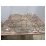 Grouping of beautiful clear glass, frosted glass, etched glass divided and non-divided serving trays