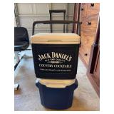 (2) insulated coolers…..top is an Igloo24 and has Jack Daniels logo and info - bottom is by Coleman model 6219 on wheels