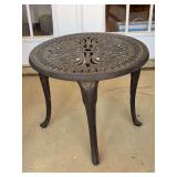 Black metal patio side table with decorative top…..21”D x 18-1/2” tall