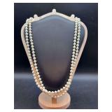 Opera length lightweight strand of white beads…..doubled for pics