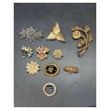 Stunning collection of vintage brooches….many different designs and styles for every occasion…..some have missing stones