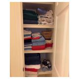 Contents of bathroom linen closet…..towels, (2) NEW tub mats, blow dryer and more