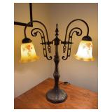 Vintage-style bronze double-light table lamp, possibly modeled after antique designs from Tiffany Studios, featuring pale yellow floral satin finish shades…..19-1/2w x 21-1/4 tall…..working condit