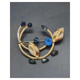 Nice looking sterling and gold-tone brooches with blue stones…..8 grams