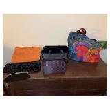 Grouping of handbags, clutches and (1) tote by Laurel Burch