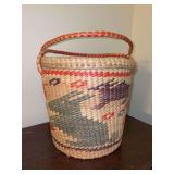 Vintage woven tourist straw basket featuring a colorful geometric pattern and “MEXICO” on lid…..13”D x 13” tall