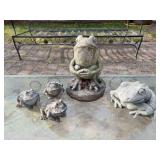 Grouping of smaller size concrete frogs