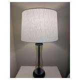 Lightly smoked glass base lamp with crinkled fabric shade…..27-3/4” tall…..working condition