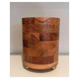 Segmented wooden cylindrical utensil holder with gold-tone feet…..5”D x 7” tall