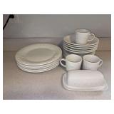 20 miscellaneous pieces of Gibson Housewares dinnerware featuring a raised, white fruit and grapes embossed pattern - 3 cups, lidded butter dish, 6 salad plates, 5 soup bowls, 5 dinner plates….2 add
