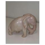 Hand-carved stone elephant figurine….5” long x 4-1/4” tall….head is not cracked, part of design