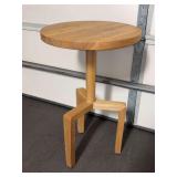 Modern solid wooden tri-pod table…..17-3/4”D x 28-1/4 tall…..spots on top