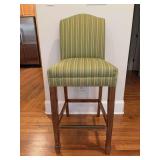 Great looking wood base bar stool with shades of green striped upholstery and brass plated footrest…..18-3/4 x 15-1/2 x 30-1/2 tall to seat (46-1/2 tall overall)