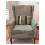 Wingback chair with a soft geometric pattern upholstery and a striped lumbar pillow…..32 x 21 x 19 tall to seat (44-1/2 tall overall)