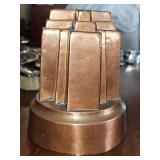 Antique copper jelly mould featuring a design known as the 'Alexandra Cross'. 'REGISTERED APRIL 29.1883' indicates its registration date during the Victorian era. Opening diameter 5.25X 6.5 in tall.