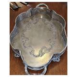 Silver color scalloped serving tray marked Victoria Sheffield collection. Lovely design. 9 x 16.25 x 2.25 in tall.
