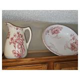 Red transfer wear bowl and pitcher. Pitcher is approximately 11 in tall, bowl is approximately 15-in diameter.