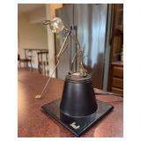 Vintage "The Golfer" kinetic sculpture was created by Gordon Bradt for Kinetico Studios between approximately 1975 and 1985….. mechanized figure is made of metal wire and brass, designed to swing a 