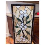 Stained glass panel depicting blooming dogwood design…..23-3/4 x 47-1/2…..one small damaged area in lower right corner and does have a slight bend
