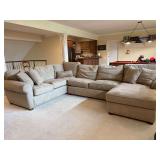 Alan White tan microfiber sectional with sleeper sofa center and chaise on one end…..BUYER MUST PROVIDE HELP TO LOAD/TRANSPORT AND ALLOW ENOUGH TIME THE DAY OF PICKUP - unit is located upstairs
