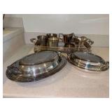 Grouping of various silverplate items…..casserole carrier, mint julep cups, creamer/sugar set, covered casserole pieces - makers include Crescent, William Adams, Newport, Leonard, St. Louis Silver, 