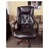 Solid wood frame black leather office chair….it does show wear from normal use but still a comfortable solid piece…..28-1/2 x 20-1/2 x 19-1/2 tall to seat (46 tall overall)