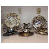Nice grouping of silverplate items - gravy boats and under trays, small creamer/pitcher, clam shell serving dish, round swirl serving piece - makers include Gorham, Crescent, Wm Rogers - all need poli