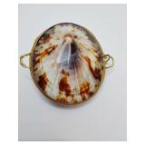 Vintage trinket or pill box made from a natural limpet sea shell featuring gold-tone brass hinges and trim. Also used for gift/engagement ring box.