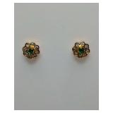 Flower stud earrings, green center stone, surrounded by clear stones in gold setting. Backs have 14K stamped on them, weigh 2 grams.