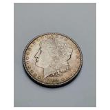 United States 1898 Morgan Silver Dollar. Weighs 26 grams.