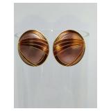 Vintage copper and gold tone stud earrings featuring a geometric design. Clip-on.