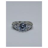 Vintage Silver Rhinestone Avon Ring. Large center stone flanked by two smaller triangular side stones. Size 7.
