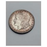 United States 1899 Morgan Silver Dollar. Weighs 26 grams