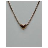 Dainty 14K gold heart pendant necklace, chain clasp 14K also, 8" long. Weighs 0 grams.