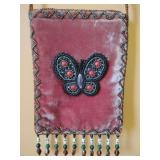 Beaded mauve velvet bag featuring a butterfly motif, 4 3/4" x 6 1/2", beaded strap 24" long