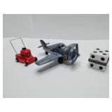Porcelain hinged trinket boxes, lawnmower, airplane, dice.