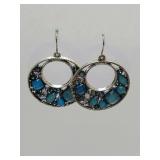 Firefly Bejeweled Open Work Circular Disc Hoop Earrings in a blue colorway, featuring a mosaic of crystals set in a silver-tone metal.