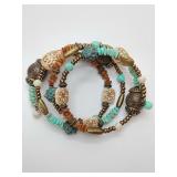 Coil Bracelet, turquoise, brass, cream beads.