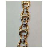 Vintage 14k yellow gold interlocking link bracelet with 12 clear stone accents, weighs 28 grams. 7" long
