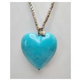 Vintage Nine West brand necklace features a blue heart-shaped pendant on a silver-toned beaded chain.