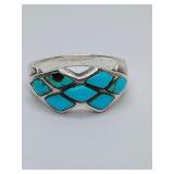 Zuni Turquoise Sterling inlay, size 7, weighs 4 grams. One stone damaged, see pics.