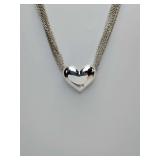 Avon vintage silver-tone puffy heart mesh choker necklace featuring an adjustable multi-strand chain design.