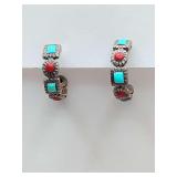 Native American-style half-hoop earrings crafted in 925 sterling silver, featuring a repeating pattern of inlaid turquoise and red coral stones, weigh 4 grams.
