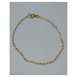Delicate 14K yellow gold paperclip chain bracelet. 7 1/2" long, cannot make out maker.
