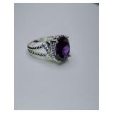 Nataliya V Collister (NVC) ring features a purple simulated amethyst stone set in a silver-tone rope band. Size 7
