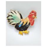 Vintage handcrafted Exclaymations art rooster brooch pin. It is made from colorful clay and finished with 22K gold trim.