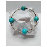 Made as Intended Blessing Bracelet, characterized by four large gemstone beads— Blue Jasper or Turquoise—separated by curved metal tube beads.